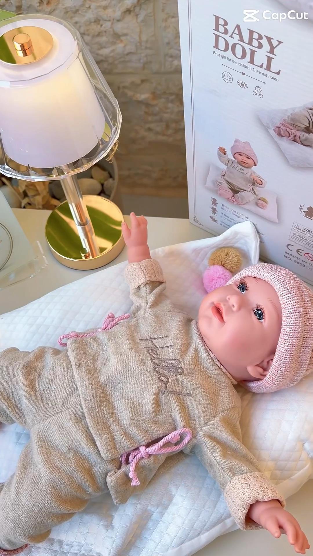Soft Baby Doll with Realistic Design and Elegant Winter Clothes video 6