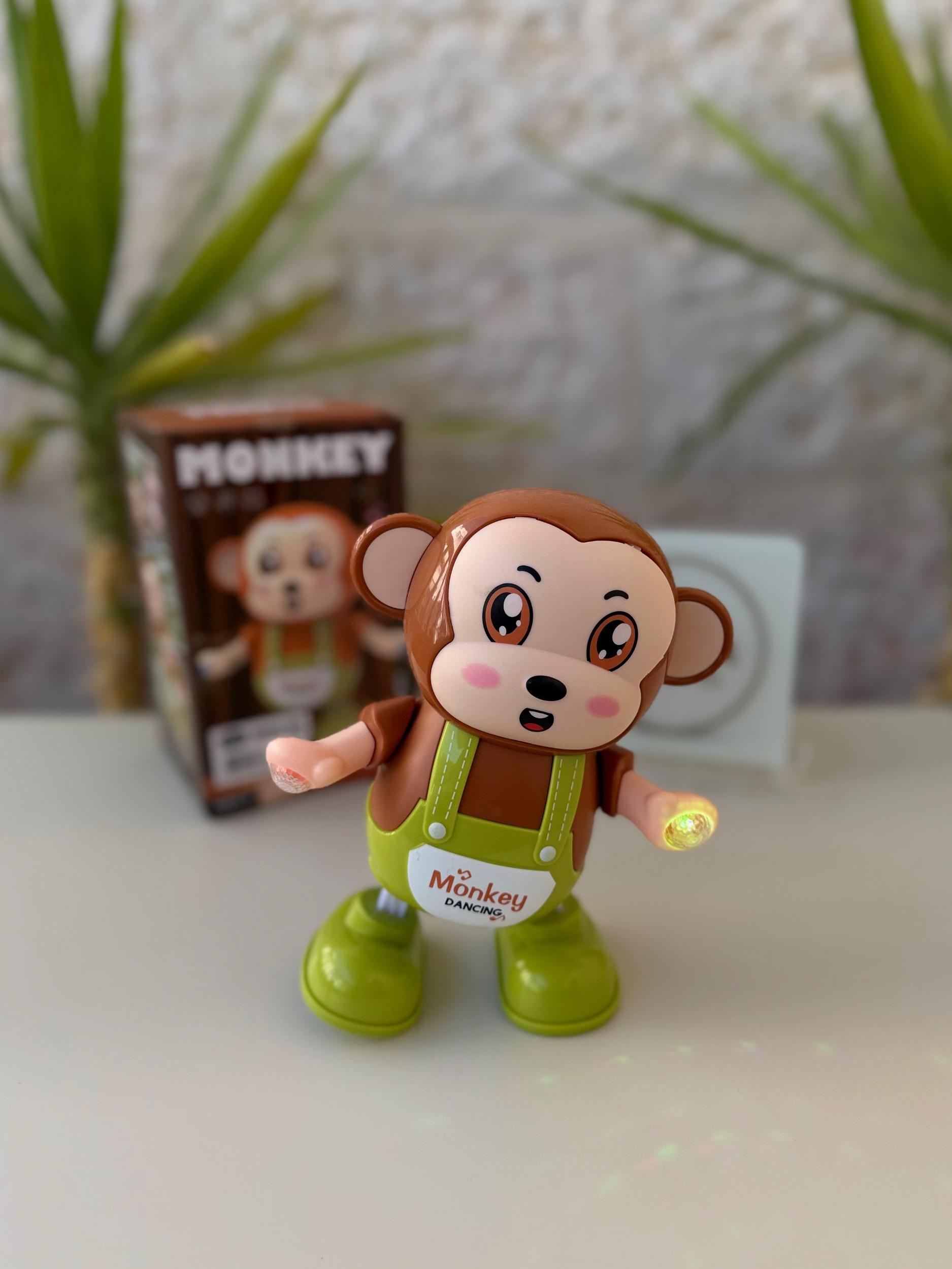 🐵 القرد الراقص الذكي مع الإضاءة والموسيقى